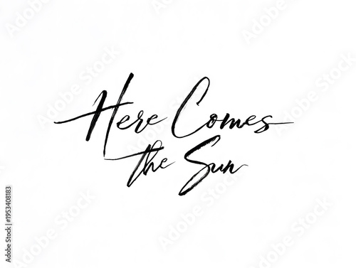 Here Comes the Sun lettering black letters on white background