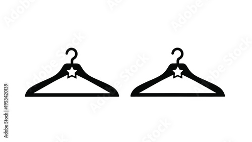Two black coat hangers with star details a striking silhouette