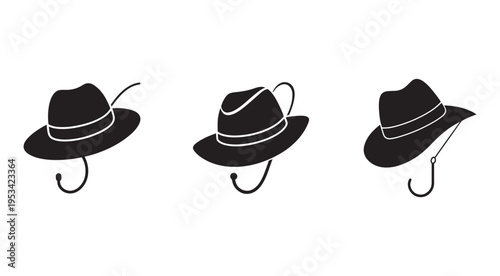 Three black hats with chin straps hanging on hooks in different positions and angles for fashion or travel  various cowboy hat silhouettes