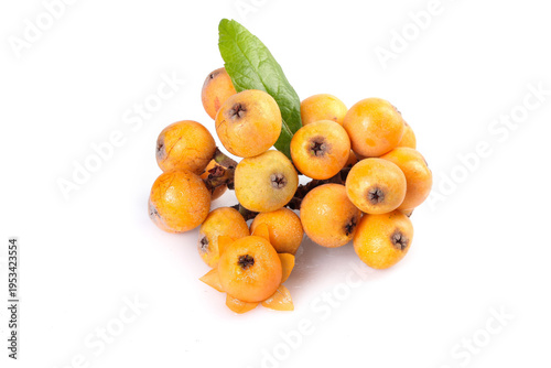 Quadro su tela Fresh Loquat Pipa Fruits from Yunnan Mountain High Altitude with Leaf on White B