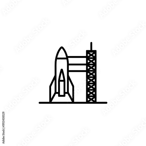 space shuttle on launchpad at night