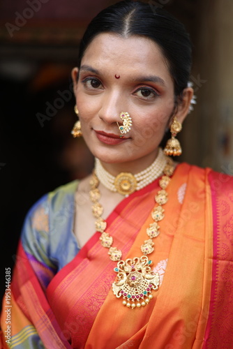 An Indian young woman in a traditional Marathi attire on a Hindu festival. 