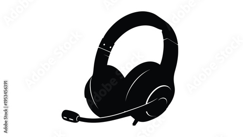 Black headphones with microphone shown as a stark silhouette