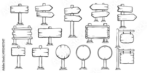 Various road signs are displayed on different stands outdoors.