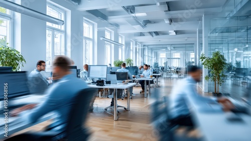 Busy Modern Office Space with Employees Working at Desks
