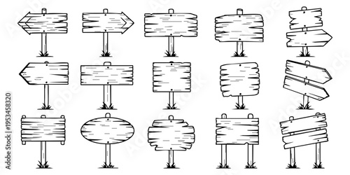 A collection of wooden signs on posts in various shapes and directions.