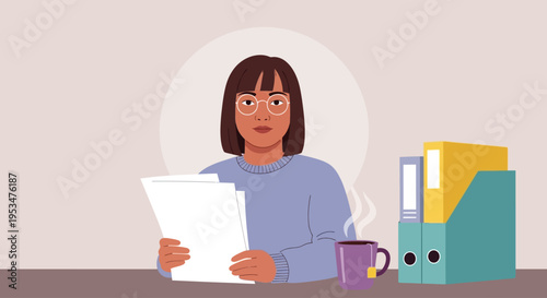 Woman sitting at desk reading documents with coffee and files nearby.