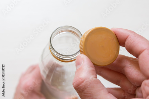 Remove the cork from an empty bottle to send for recycling.