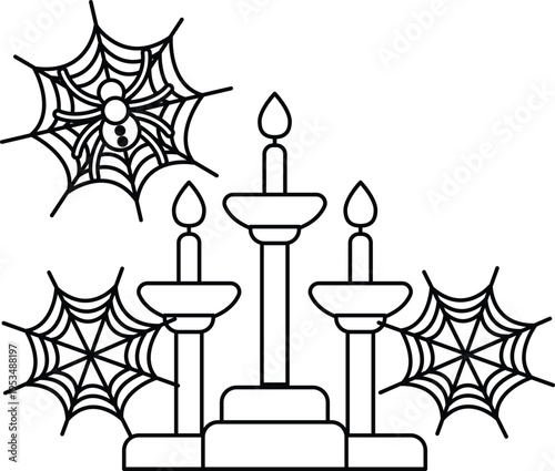 Candles glow warmly beside spiderwebs