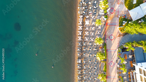 Wallpaper Mural Marmaris, Turkey. Early morning top-down view of promenade with perfectly arranged sunbeds and umbrellas. First line cafes and hotels before tourists arrival.. Aerial View Torontodigital.ca