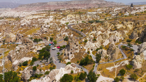 Wallpaper Mural Goreme, Nevsehir, Turkey. Sky view of the ancient Monastery of Nuns and Monks, a multi-level rock-hewn monastic complex in the heart of Goreme Open Air Museum.. Aerial View Torontodigital.ca