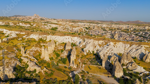 Wallpaper Mural Goreme, Nevsehir, Turkey. Drone view of the distinctive phallic rock pillars and eroded formations that define the landscape of Gorkundere Valley.. Aerial View Torontodigital.ca