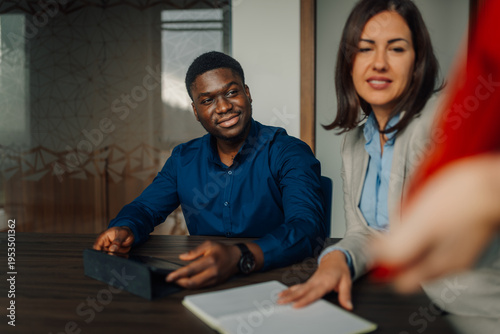 Diverse business team collaborating during office meeting
