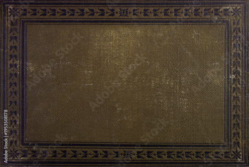 Very old book damaged brown fabric hardcover, with frame close up texture