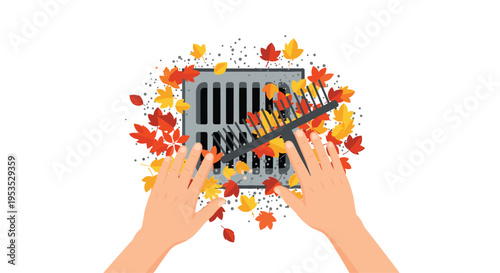 A pair of hands uses a small rake to clear colorful autumn leaves and debris from a metal storm drain grate.