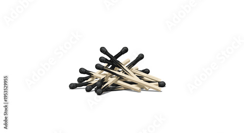 A small, scattered pile of both burnt and unburnt matches rests on a clean white surface.