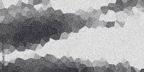 Textured abstract grayscale background with irregular polygonal shapes and a subtle grainy effect, ideal for digital art and graphic design projects