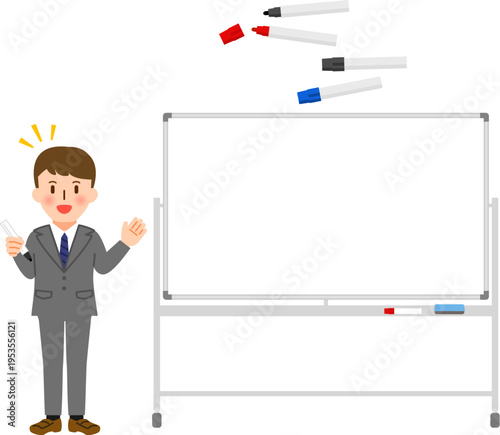 ホワイトボードと、マーカーを持ったスーツの男性