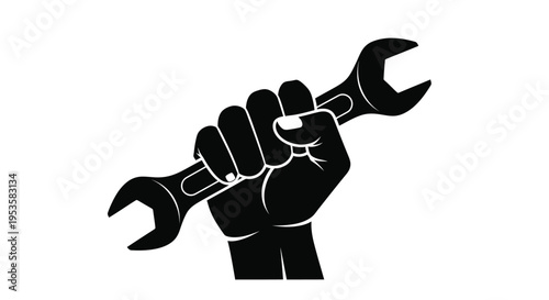 A clenched fist powerfully gripping a large open ended wrench