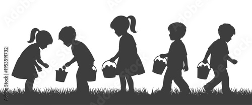 Silhouette of young children with baskets searching for hidden Easter eggs in the grass