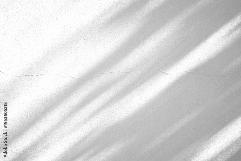 Fototapeta premium Soft Diagonal Window Shadows on Minimalist White Textured Wall Background