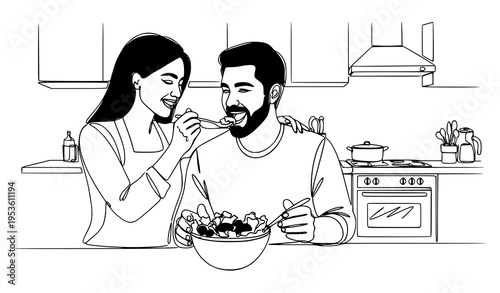 A couple enjoying a healthy meal together in a modern kitchen