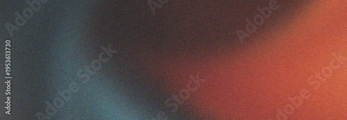 Abstract grainy gradient texture with blurred blue and orange lights