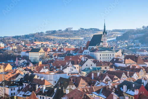 View of historical centre of Cesky Krumlov town on Vltava riverbank on autumn day overlooking medieval Castle, Czech Republic. View of old town of Cesky Krumlov, South Bohemia, Czech Republic.