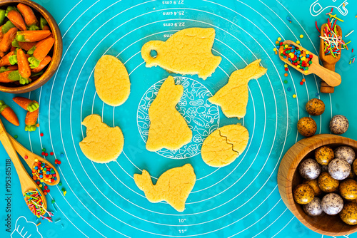 Easter cookie crafting involves creating festive treats by cutting shortcrust dough into traditional shapes like bunnies, eggs, and chicks using special cookie cutters, following detailed traditional 