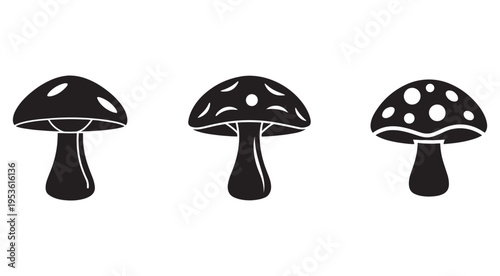 Set of three black silhouettes of different mushrooms with spots on caps isolated on white background