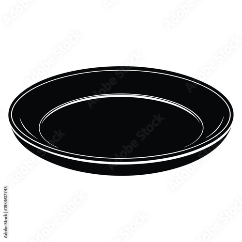 A simple black plate presented on a white background isolated and with a smooth surface