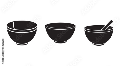 Three black bowls with white lines one with spoon inside isolated on white background