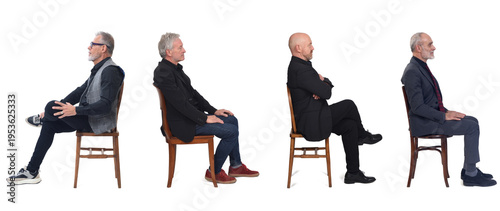side view of a group of mature men sitting on chair on a white background