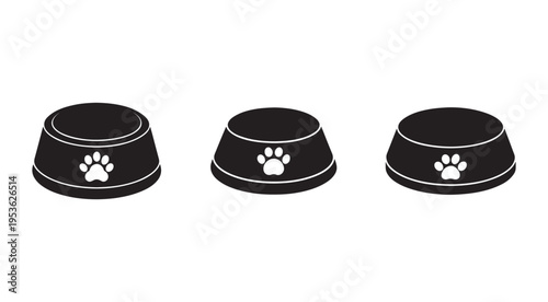 Three black dog food bowls with white paw prints on a white background