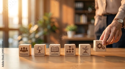 Close up of wooden blocks representing learning, planning, and business growth.