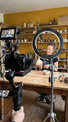 Wallpaper Mural Creator filming pottery demonstration with ring light and professional camera equipment in studio Torontodigital.ca