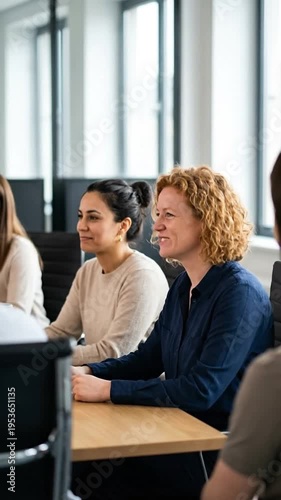 Wallpaper Mural Diverse group of professionals in a modern office meeting, focused and engaged. Torontodigital.ca