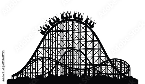 Silhouette of a classic wooden roller coaster with riders in silhouette
