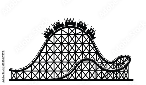 Silhouette of a large roller coaster with riders in silhouette