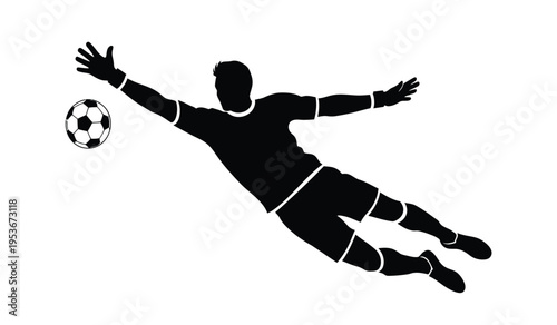 Silhouette of a soccer goalkeeper diving to catch a ball in mid air