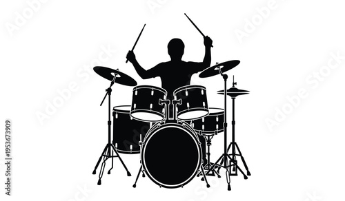 Drummer silhouette playing a drum set with enthusiasm and energy