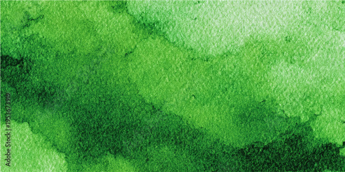 Abstract watercolor of vibrant and soothing shades of green creates a captivating textured artwork.