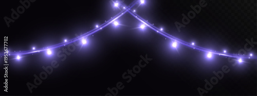 Glowing garland light string with purple sparkle on dark background festive decorative illumination effect.
