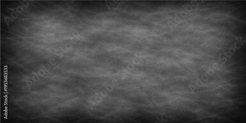 Chalkboard Texture for Education and Design: A close-up view of a blank chalkboard. The rough texture creates a perfect backdrop for education, design, or creative projects.