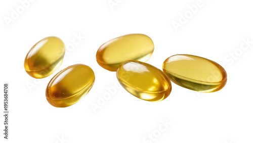 Fotografija Five golden translucent softgel capsules, rich in omega-3 fish oil or vitamin E,