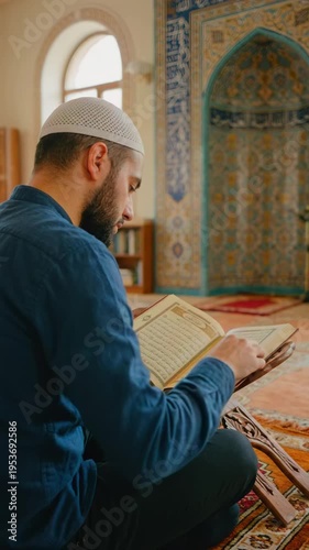 Muslim man reading Quran on prayer mat in ornate mosque. Bearded man with kufi cap studying holy book. Islamic faith and Ramadan worship concept