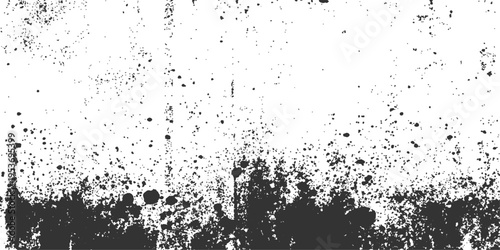 Grunge texture with dark splatters and a rough, uneven surface, a visually arresting and textured backdrop, conveys a sense of age and imperfection.