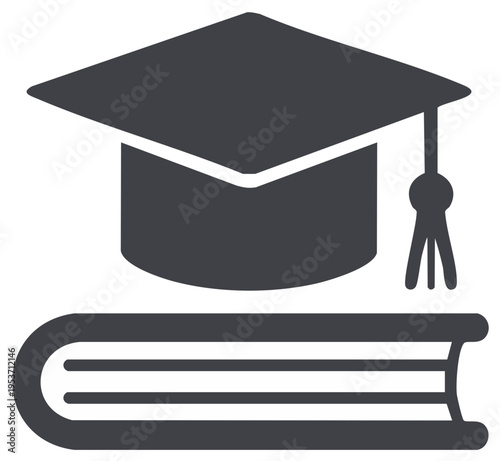 Graduation cap sits atop a thick book indicating academic achievement and higher learning