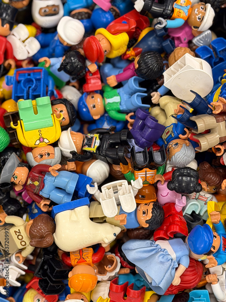 Obraz premium Colorful pile of miniature toy figures