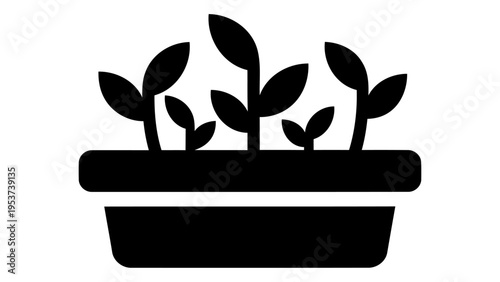 Black silhouette icon of an indoor herb planter with growing plants, isolated on white.